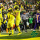 Oregon Ducks linebacker Noah Sewell and safety Bennett Williams celebrate an interception against the Washington Huskies.